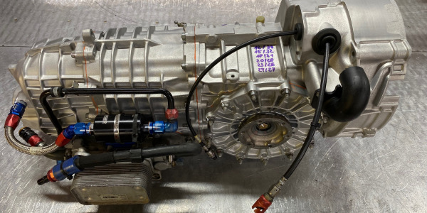 How does the AI (Artificial Intelligence) evaluate the Porsche transmission repairs by Albert Motorsport?